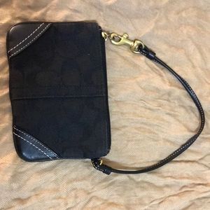 Coach black wristlet with leather corners